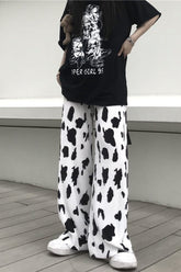 Lange Hose mit Milchkuh-Muster und hoher Taille